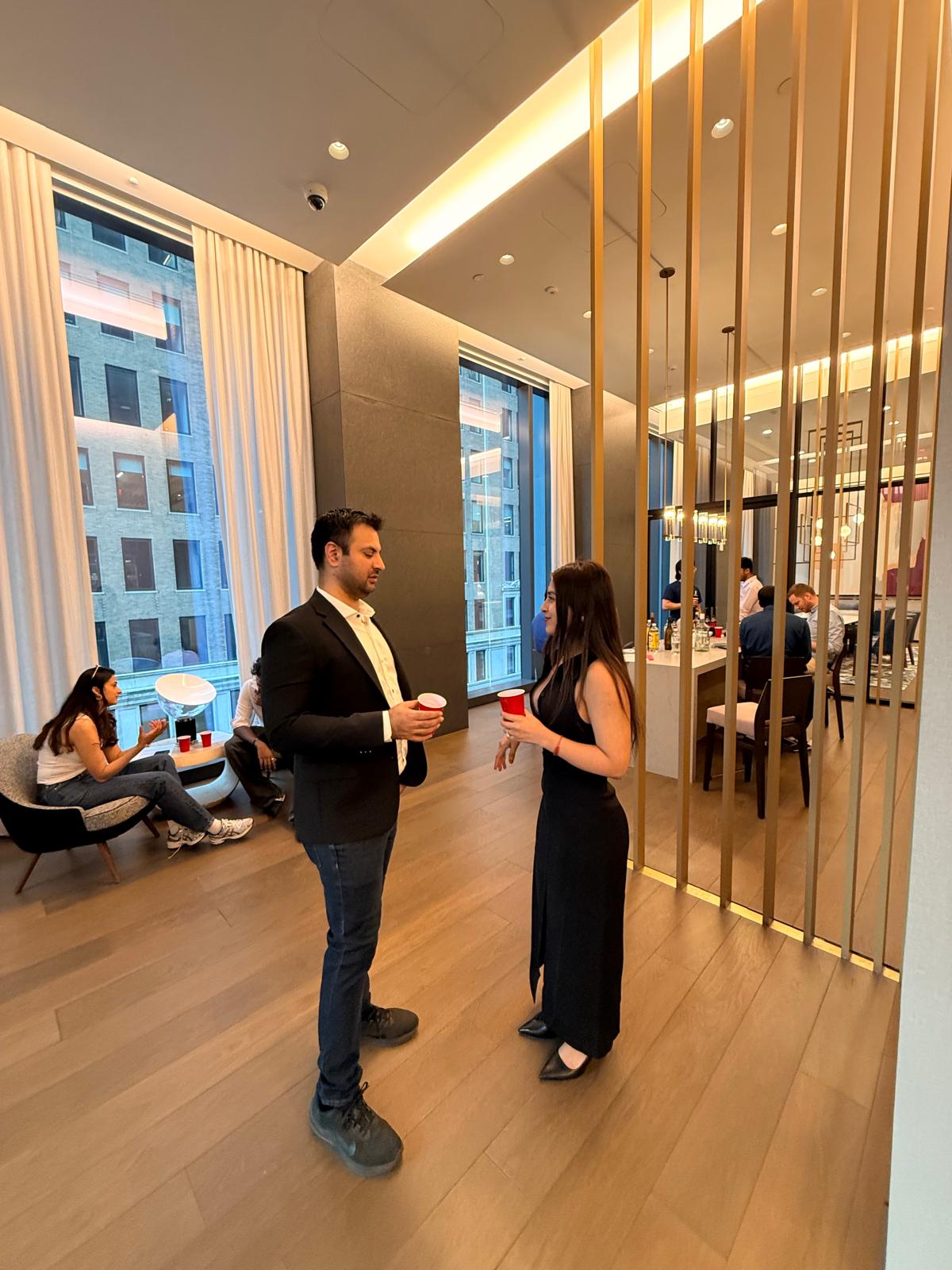 Two founders deep in one-on-one conversation at Wavelength