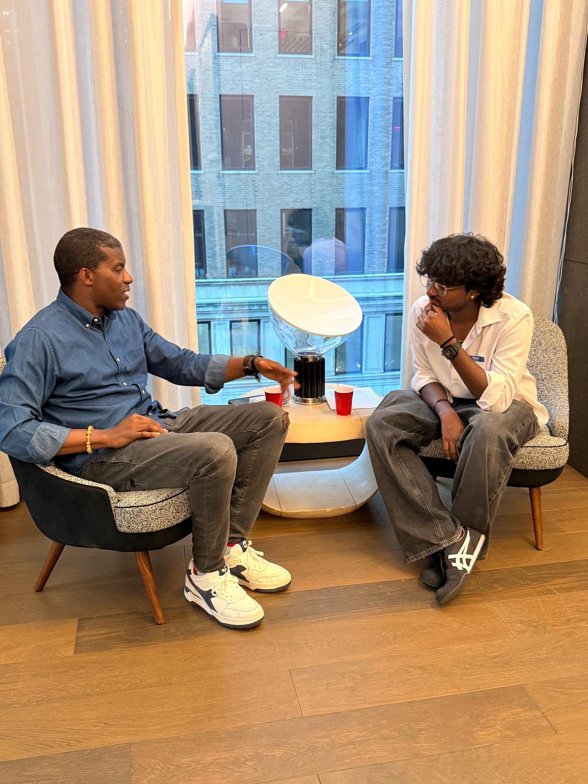 A one-on-one conversation in lounge chairs at Wavelength