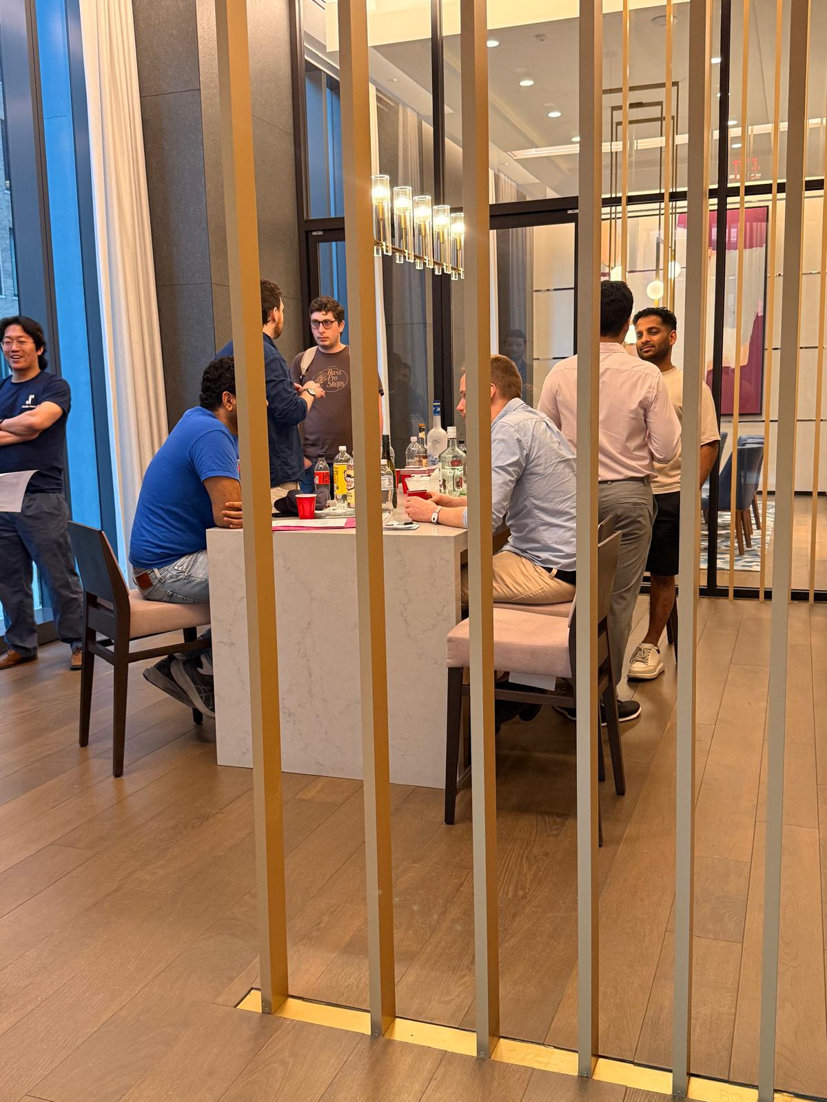 A group conversation through the venue's gold dividers at Wavelength